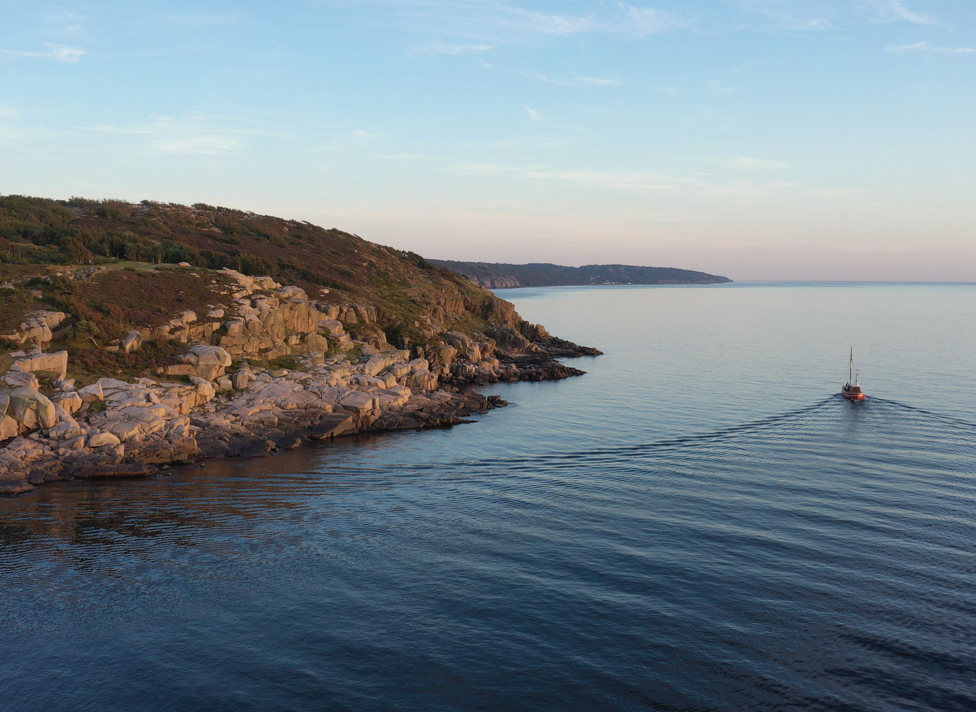 Passing the tip of Hammeren, with a glimpse of Vang in the horizon